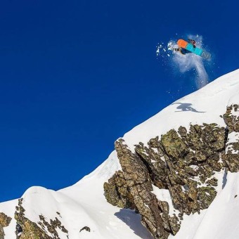 Soaring snowboarder