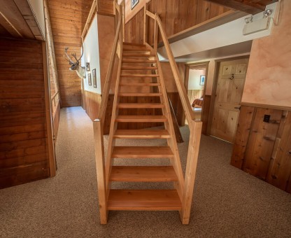 Wooden staircase at Silvertip Lodge